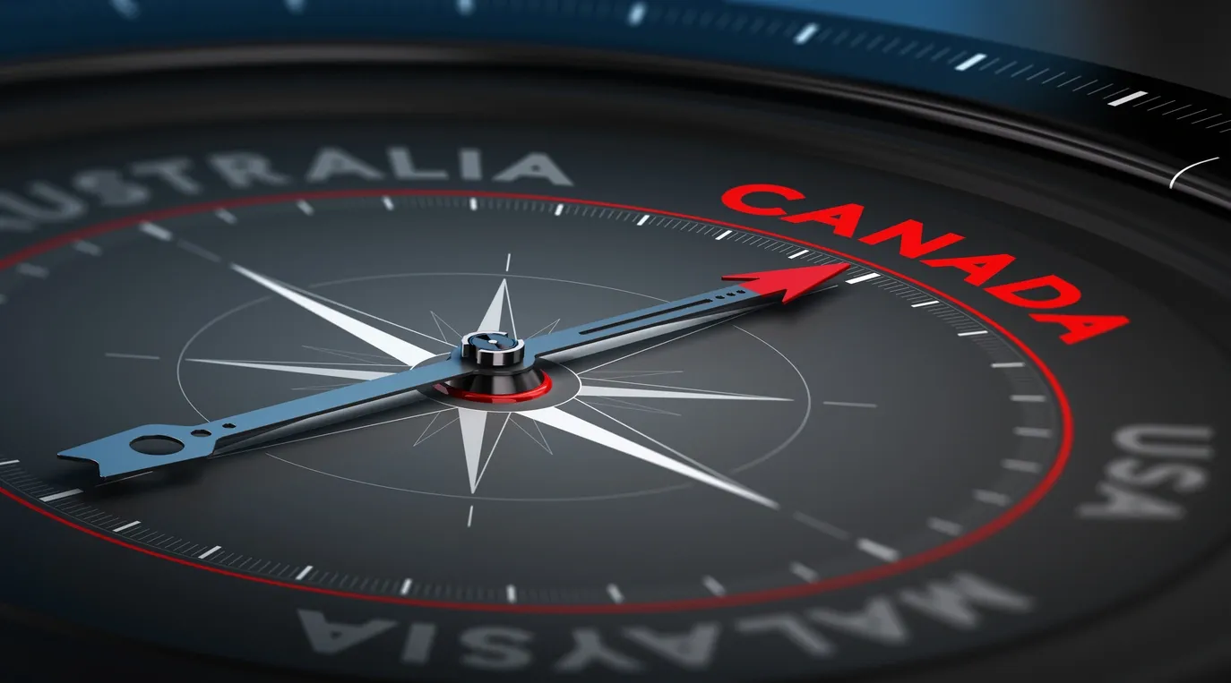 Professional immigration consultant reviewing documents with clients in modern office setting